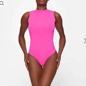 SKIMS Essentials Crewneck Bodysuit Highlighter Pink